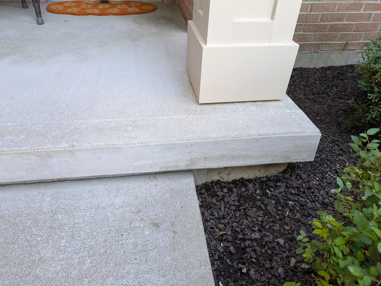 Front porch edge after the damaged section was rebuilt and finished