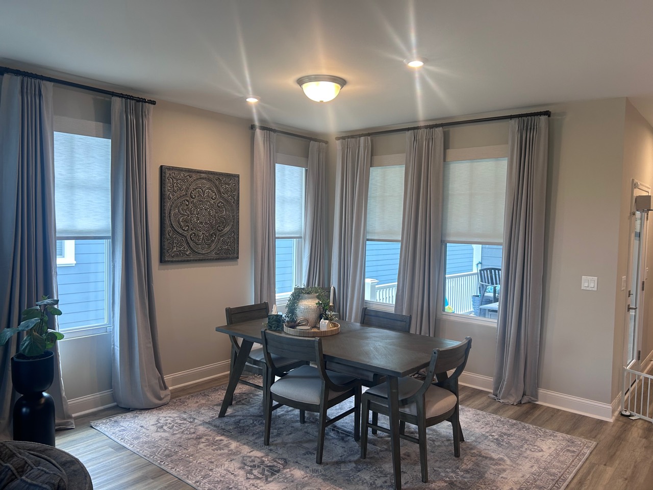 Dining room before FLEX it replaced the builder-grade flush-mount ceiling light