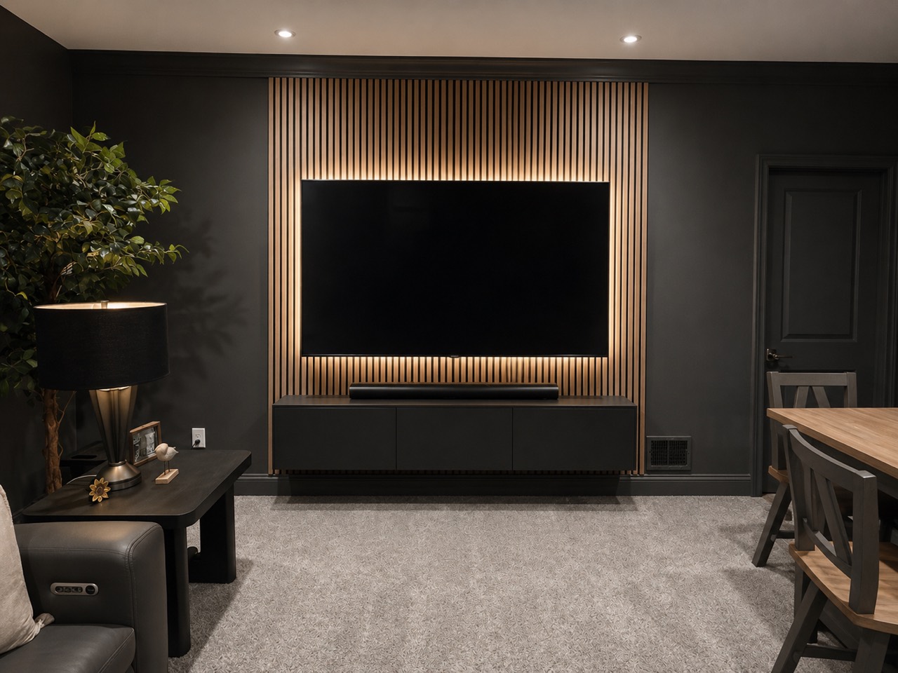 Customer-provided concept for a dark TV feature wall with vertical wood slats and accent lighting